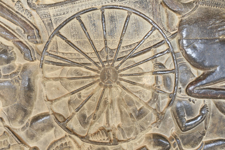 close-up texture of stone carving ancient bas-reliefs of the Temple of Angkor Wat in Cambodiaの写真素材