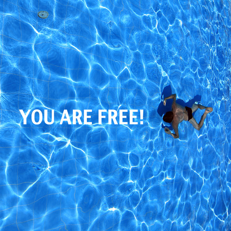 isolated azure water pool and swimmer in the water