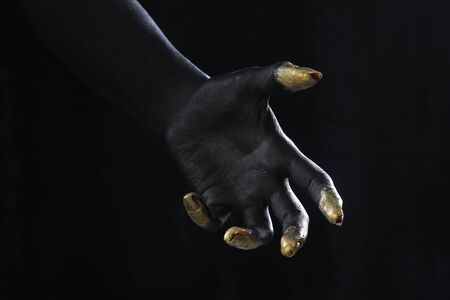 portrait nude of a slim young woman with painted body, body art in black and whiteの写真素材