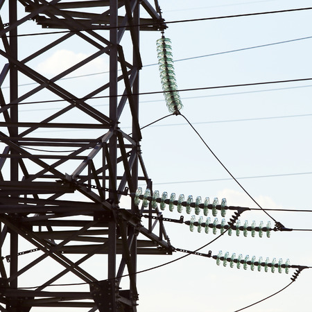 industrial landscape, high-voltage line on the sky background in summer sunny dayの写真素材
