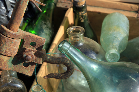 macro old glass bottles at flea marketの写真素材