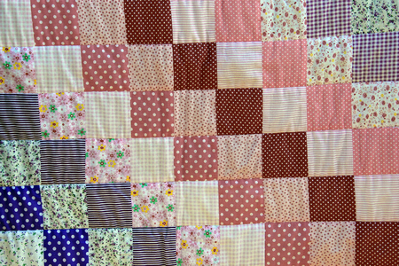 macro texture background patchwork of multicolored pieces of fabric