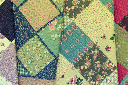 macro texture background patchwork of multicolored pieces of fabric