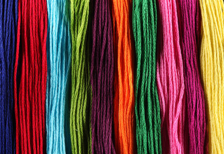 bright iridescent thread floss for embroidery and needleworkの写真素材