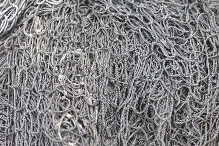 Photo pile of old fishing nets closeup