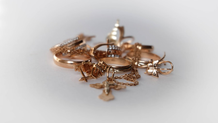 gold jewelry in whiteの写真素材