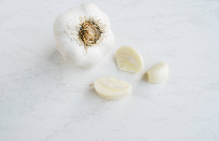 Fresh garlic isolated on white backgroundの写真素材