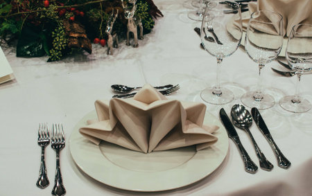 Serving of the festive table.Christmas table settingの写真素材