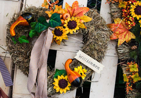 autumn wreath with sunflowers and berriesの写真素材