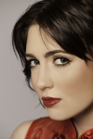 Portrait of beautiful dark haired woman with red lipsのeditorial素材