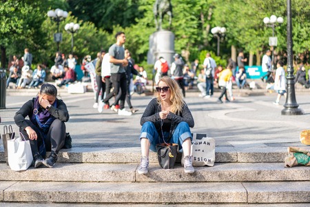 NEW YORK, USA - JUNE 3, 2018: Manhattan street scene. The Americans on the streets of New York. Union square parkのeditorial素材