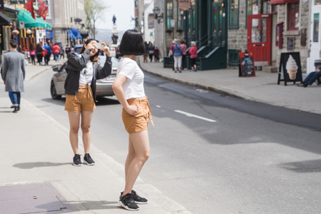 QUEBEC CITY, CANADA - MAY 19, 2018: People at streets. Locals and tourists in Quebec city.のeditorial素材