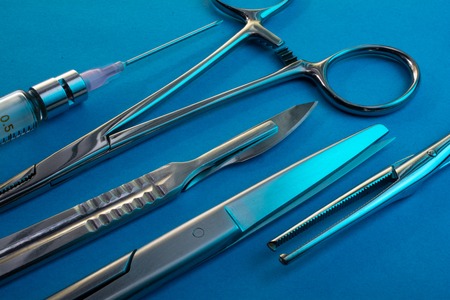 Many instrumental for surgery in blue backgroundの写真素材
