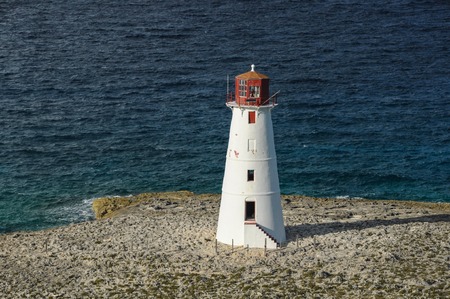 NASSAU, BAHAMAS - December 18, 2011: Small lighthouse to get the port. View from the ship.のeditorial素材