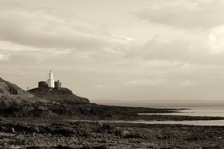 A lighthouse situated on a rise in Swansea West Walesの写真素材