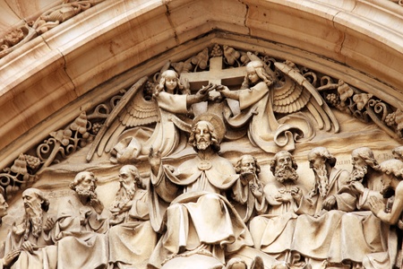 Religious carvings above the door of a churchの写真素材