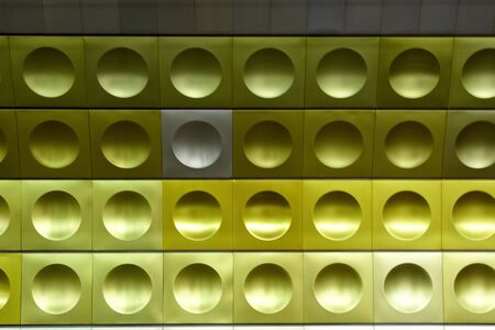 Green and yellow circles on the underground