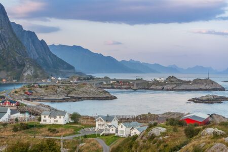 norwegian village with dramatic sunset in background, Reine lofoten, Norway. Amazing landscape.の写真素材