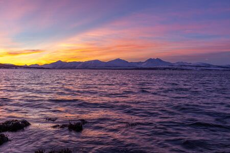 sunrise with amazing magenta color over Tromso, Norway. Winter. Polar night. long shutter speed