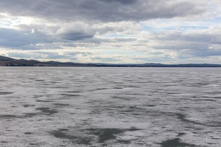 Spring nature. Melting ice on rivers and lakes. Sunny day in Siberia . Beautiful spring landscape....