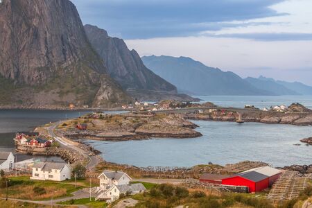 norwegian village with dramatic sunset in background, Reine lofoten, Norway. Amazing landscape.の写真素材