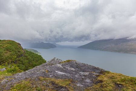 Impressive summer view of fjord in Norway. Colorful morning scene in Norway. Beauty of nature concept background.の写真素材