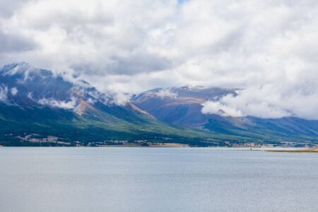 Amazing Altai natural landscape, calm lake with emerald water, surrounded by incredible mountain ice...