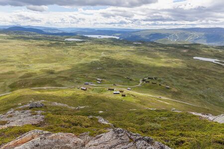Top view of a small Norwegian village in the mountains. selective focusの写真素材