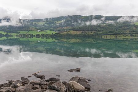 Beautiful Norwegian landscape. view of the fjords. Norway ideal fjord reflection in clear water