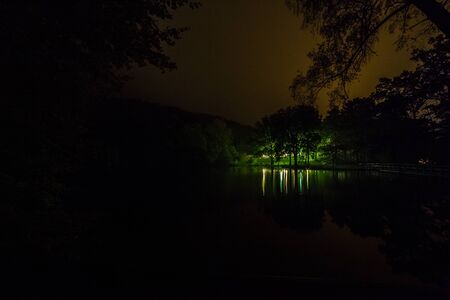 night over calm remote lake, long shutter speedの写真素材