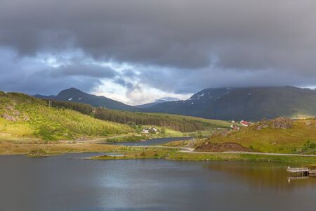 Beautiful Norwegian landscape. view of the fjords. Norway ideal fjord reflection in clear water In cloudy weather. selective focusの写真素材