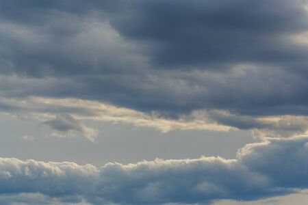 Thunderclouds on a gray sky. Beautiful background.の写真素材