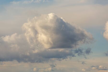 Thunderclouds on a gray sky. Beautiful background.
