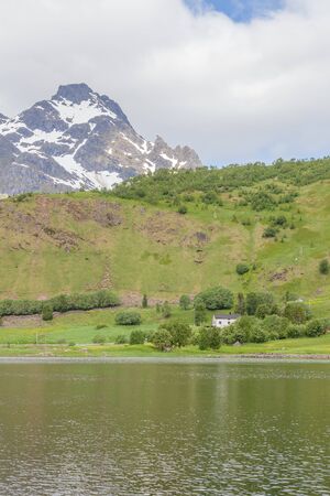 Beautiful Norwegian landscape. view of the fjords. Norway ideal fjord reflection in clear water In cloudy weather. selective focusの写真素材