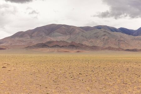 Dry Mongolian landscapes in the Altai Mountains, wide landscape.の写真素材