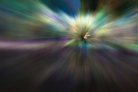 Abstract photo, forest in autumn photographed with different effects of motion and zoom. Colorful textured background. long shutter speed.の写真素材