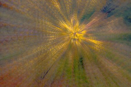 Abstract photo, forest in autumn photographed with different effects of motion and zoom. Colorful textured background. long shutter speed.の写真素材
