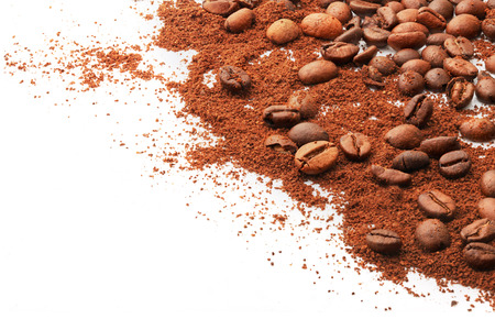 On a white background coffee beans, ground and wholeの写真素材