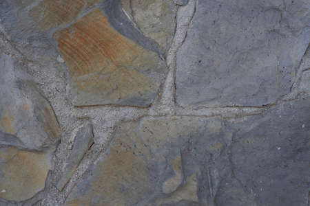 Texture of stone in cement. Gray color. Background for design