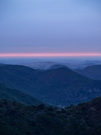 Mountain landscape at sunset, view from the top of the mountainの写真素材