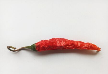Red Dry Chili Pepper Isolated On Whiteの写真素材