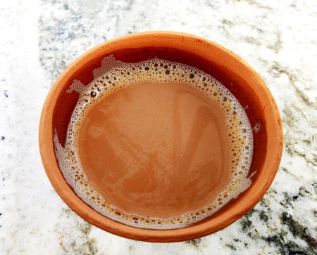 Tea in a soil made cupの写真素材