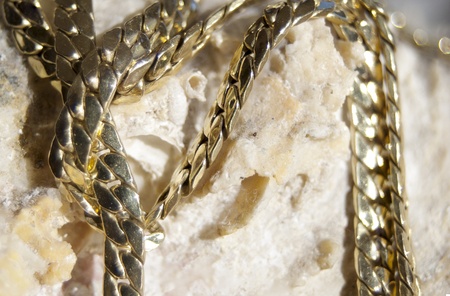 welth  gold jewelry in the foregroundの写真素材