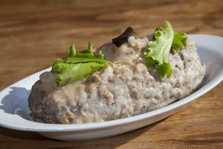 Italian cuisine: meatloaf of veal with vegetablesの写真素材