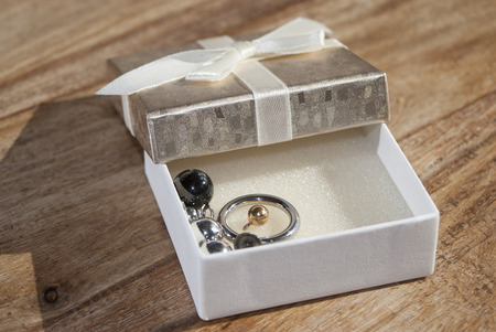 a gift box with jeweleryの写真素材