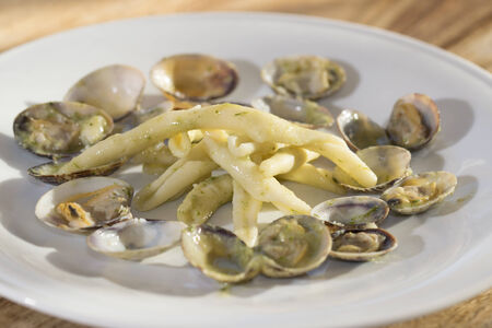 typical and traditional mediterranean dish of fish: pasta at the clamsの写真素材