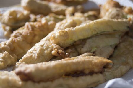 zucchini and other vegetables battered and fried