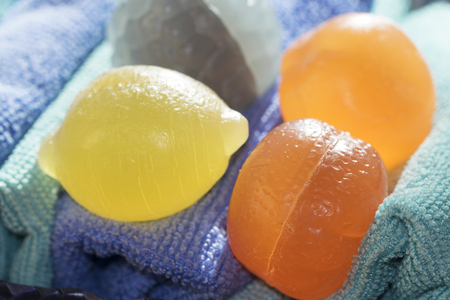 concept of personal care wellness and beauty with some colored and creative bath soapsの写真素材