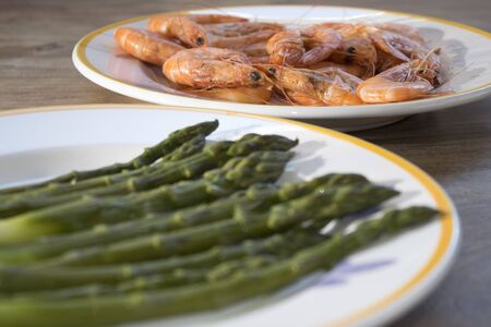 cold salad of asparagus and shrimps  cooked steamedの写真素材