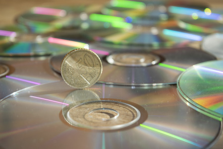 monetary system and concept of economy with cd rom and one money